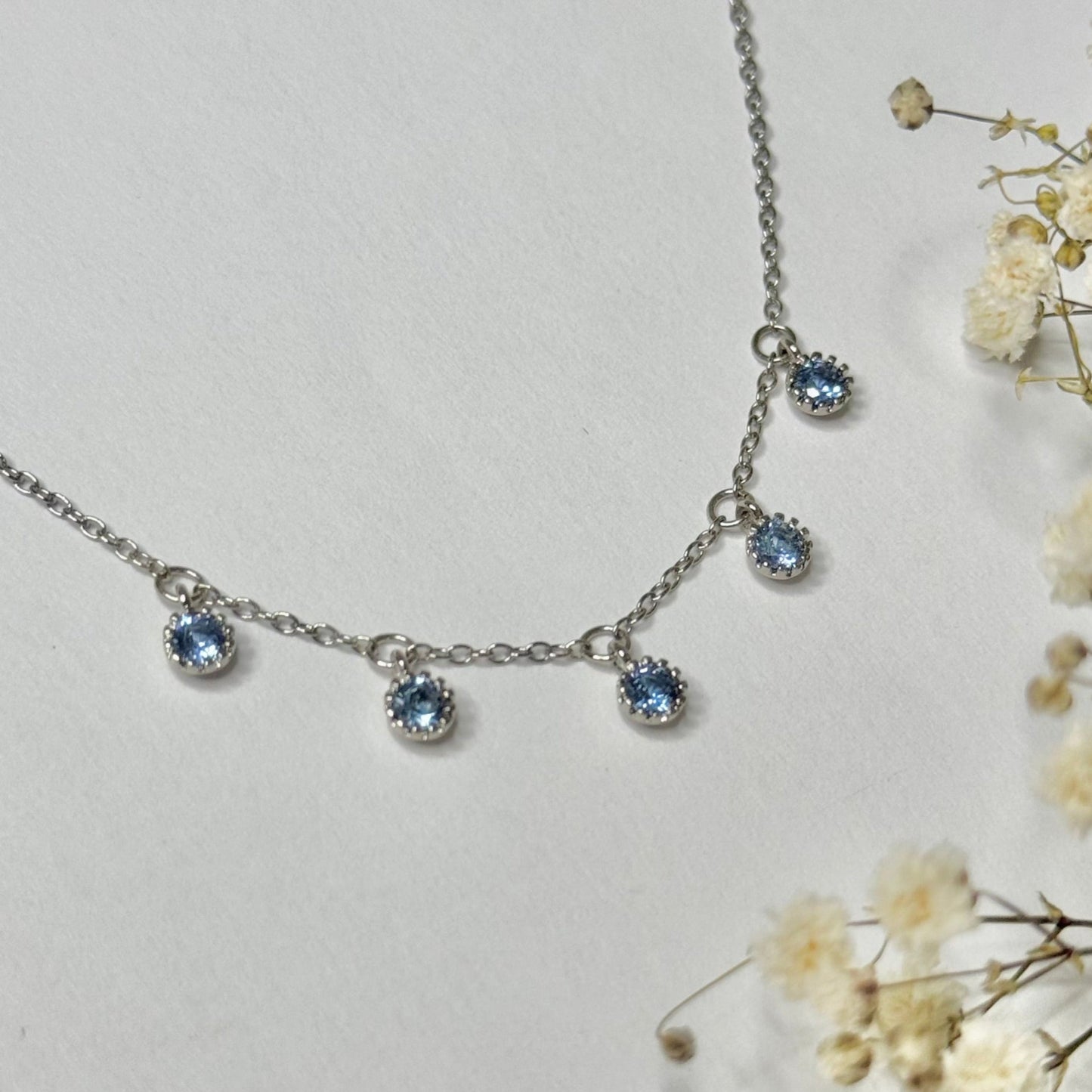 Bracelet petit poignet réglable argenté acier inoxydable pendentif bleu oxyde de zirconium