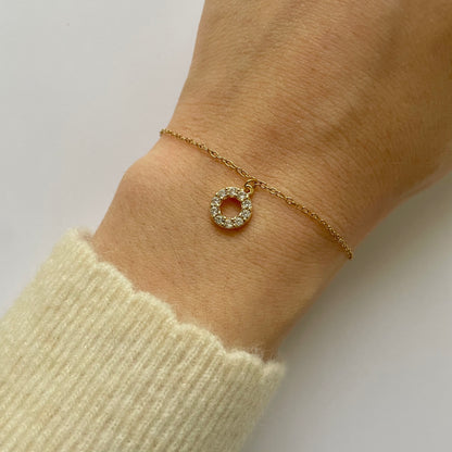 Bracelet acier inoxydable dore pendentif rond strass