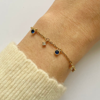 Bracelet acier inoxydable doré pendentifs ronds zircons bleu lapis losange