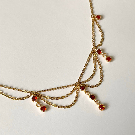 Collier acier inoxydable dore pendentifs rouge princesse