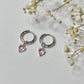 Boucles d'oreilles créoles argentées acier inoxydable torsadées et striées pendentif coeur rose